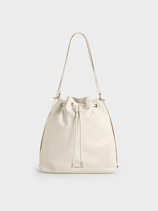 CHARLES & KEITH Neva Two-Way Bucket Bag - Cream